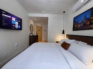 1 dormitorio, tabla de planchar con plancha, cuna de viaje y wifi
