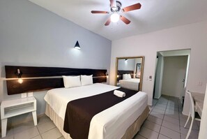 Basic Room, 1 King Bed, Non Smoking | Hypo-allergenic bedding, in-room safe, desk, laptop workspace - Days Inn By Wyndham Playa Del Carmen (Playa del Carmen)