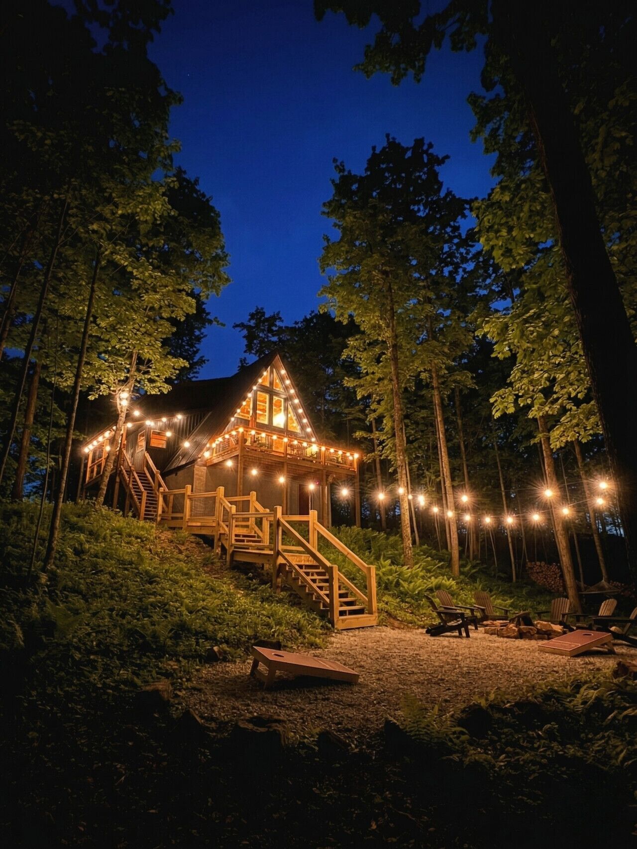 Arrive to your private A-frame retreat lit up under the Red River Gorge sky