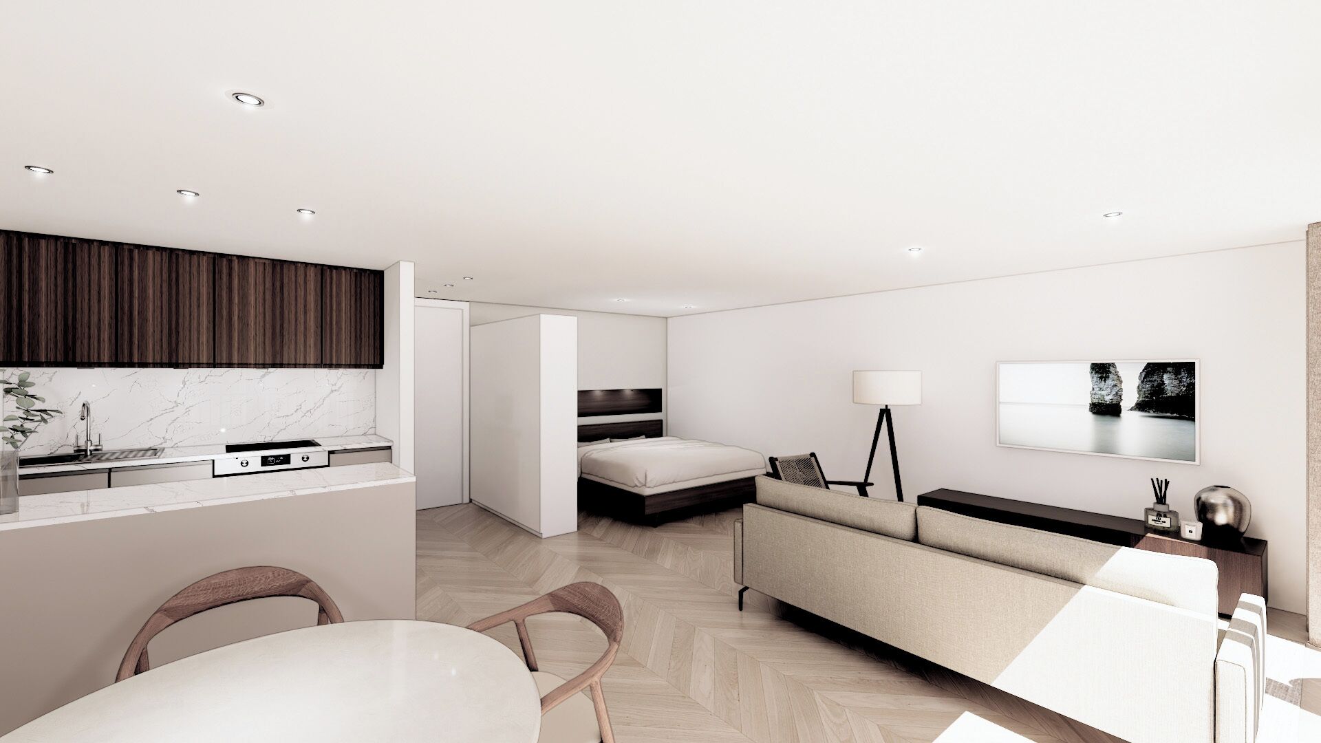 A modern hotel room with a kitchen, a sofa, a dining table, and a bed.