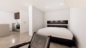 Une chambre moderne dotée d’un grand lit, d’une petite kitchenette et d’un espace salle de bain séparé.
