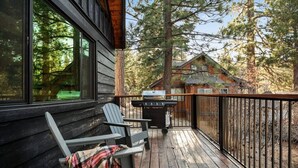 A wooden deck with two Adirondack chairs and a grill. - The Silver Coyote, w/ Bear Mtn Views & Firepit (Big Bear Lake)