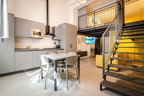 Loft (Saffi Loft 10) | Living area | Flat-screen TV - Saffi Lofts (Bologna)