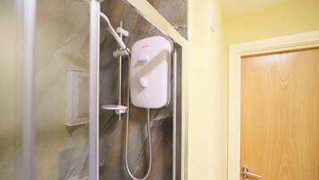 Shower, hair dryer, shampoo