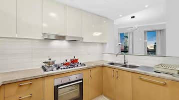 Luxury Apartment, City View | Private kitchen | Fridge, microwave, oven, stovetop
