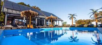 Cozy 3-bedroom cottage in peaceful Mielno with AC, Heated Swimming Pool