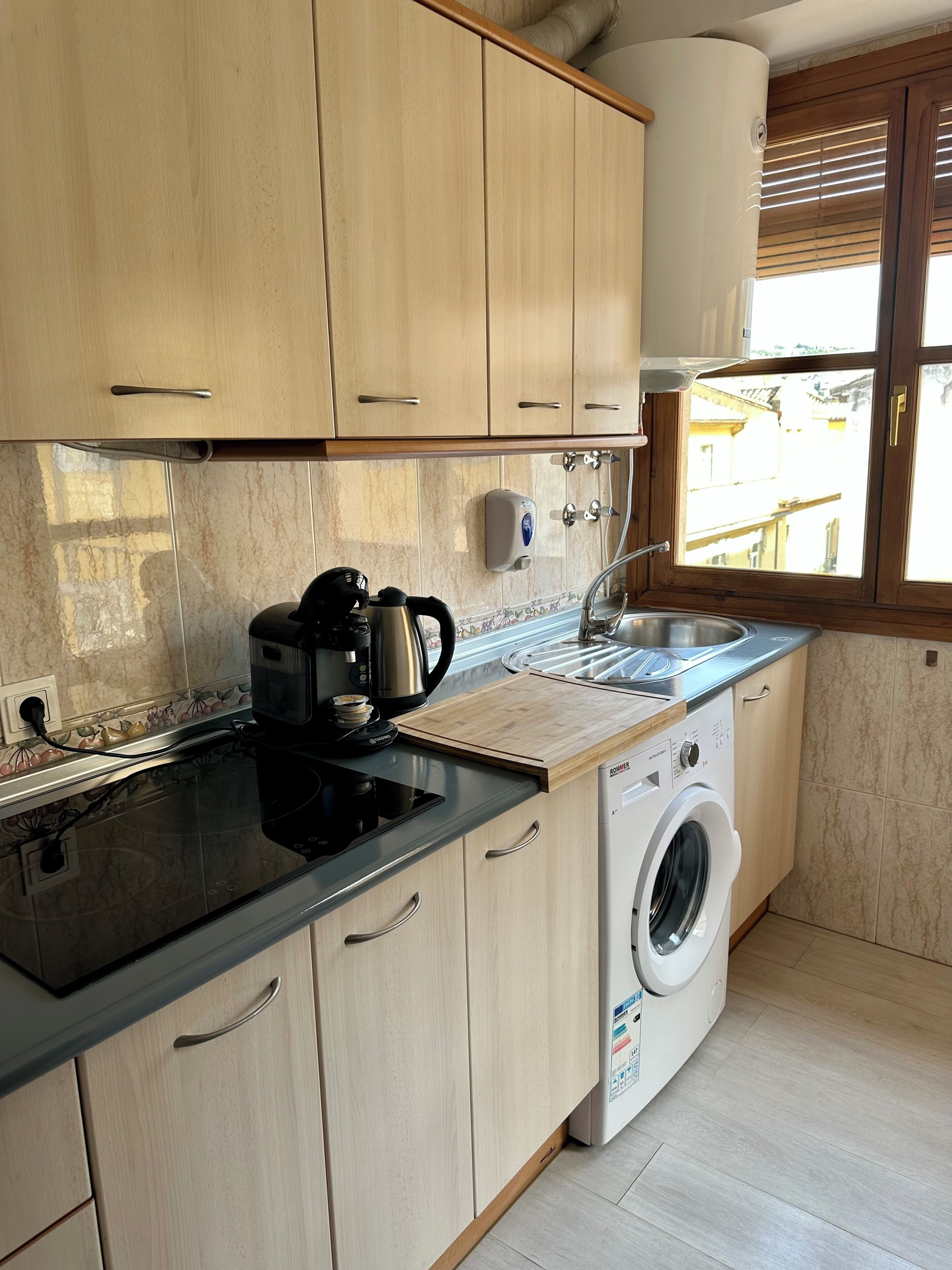 Penthouse, balcón, vista a la ciudad | Cocina privada