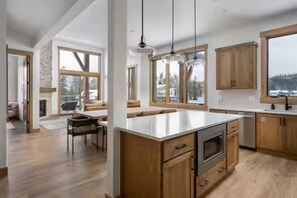 Microwave, oven, stovetop, dishwasher - Brand New Top Floor 4BR Condo with Mountain Views & Hot Tub. (Fraser)