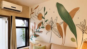 Suíte Orquídea Premium - Pousada Solar das Pétalas - FLN | 거실 공간