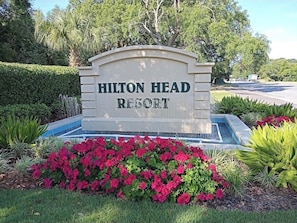A sign for Hilton Head Resort with a landscaped garden in front. - Beachfront Hilton Head Resort Villa steps to sand via private boardwalk. (Hilton Head Island)