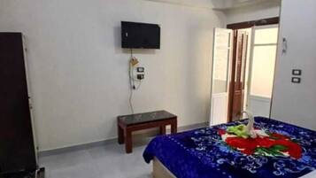 Eenpersoonskamer, gedeelde badkamer