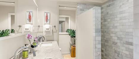Shower, jetted bath, towels, soap