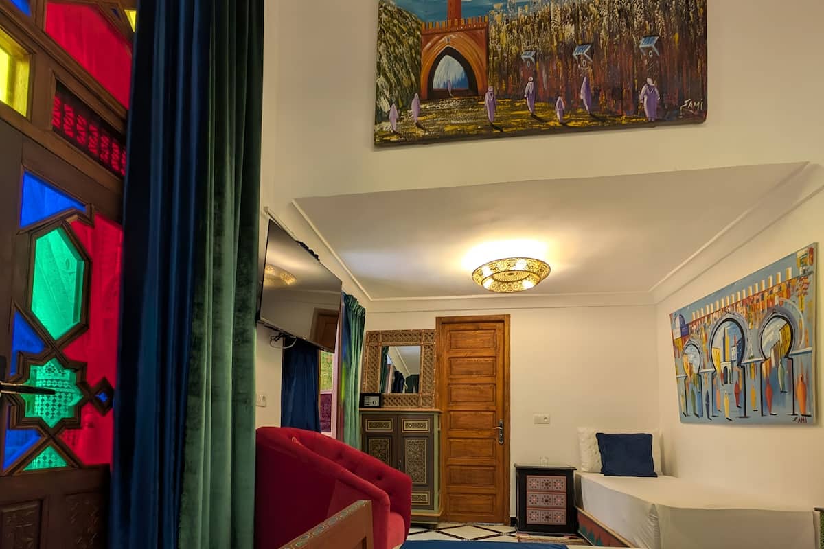 Habitació triple superior, vistes al pati