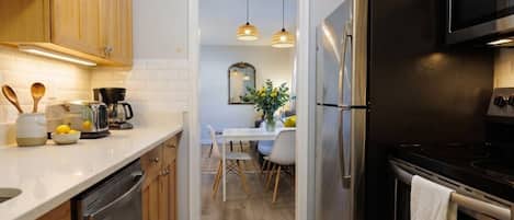 Coffee/tea maker, fridge, microwave, oven