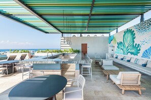 Outdoor dining - Stylish Beachside Apartment - 5th & 10th Avenue (Playa del Carmen)