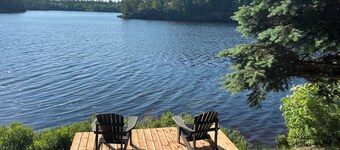 West Arm cottage with panoramic views, boathouse