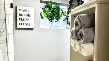 Shower, towels, soap, shampoo