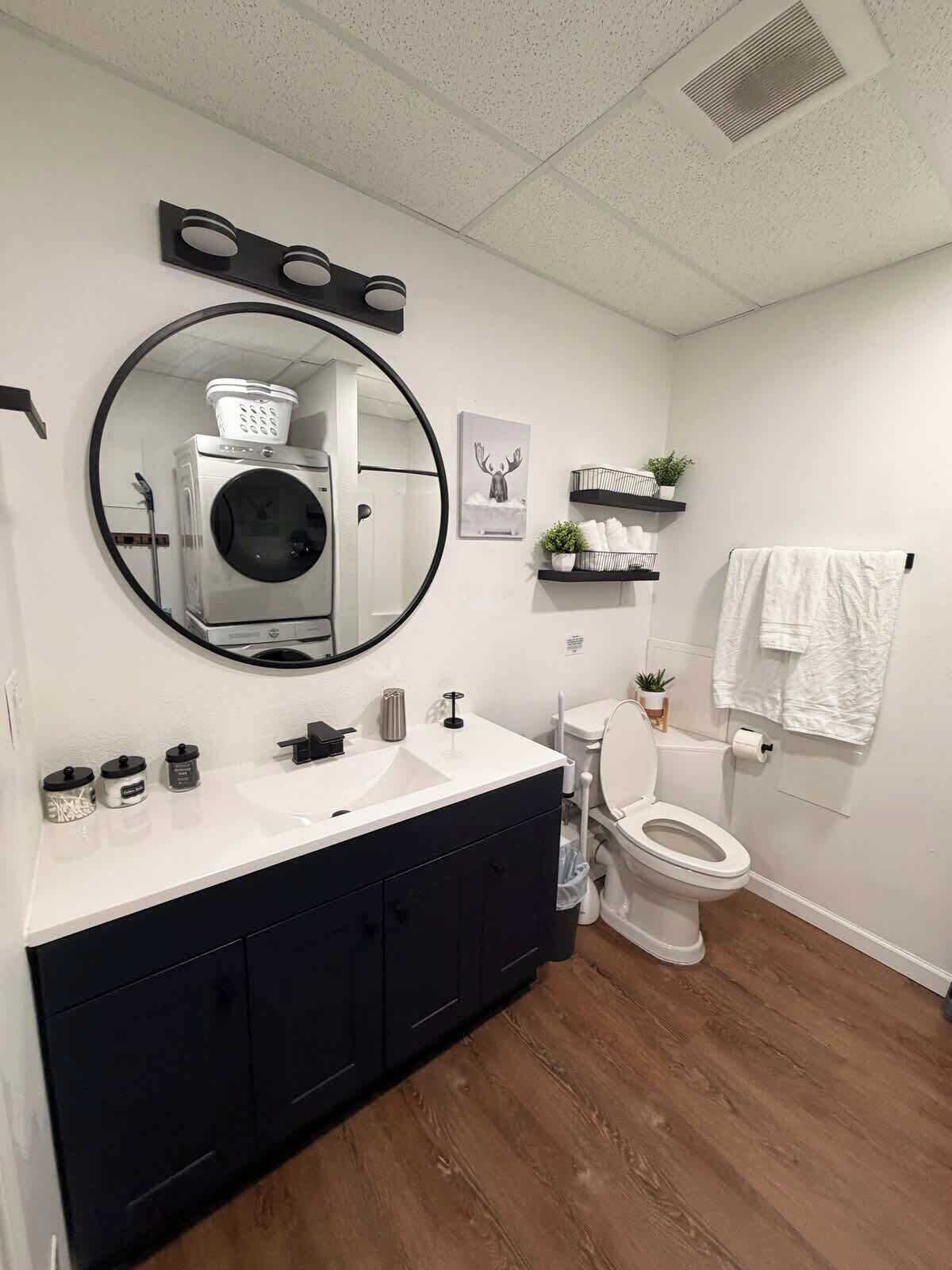 Shower, hair dryer, towels, shampoo