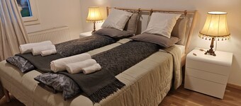 “Wake Up to Lake & Mountain Views with a Magical Summer Waterfall”