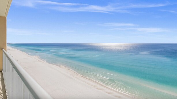 A beach view from a balcony with a clear sky. - Majestic Beach Towers 2-1704 (Panama City Beach)