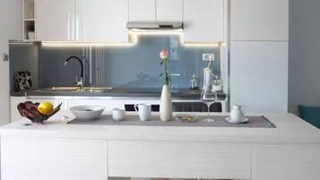 Apartment (Two Bedroom Apartment with Sea View a) | Private kitchen | Fridge