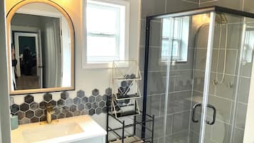 Shower, hair dryer, towels, soap