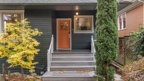 A house with a front porch, a door, and a window. - Tatalias House ~ Near Space Needle~Sports Arena~Sea Center~AC~Parking~PetsOK~NFL (Seattle)
