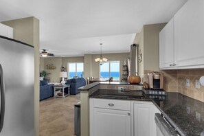 Private kitchen - Stunning corner unit in the heart of Pensacola beach with panoramic views. (Pensacola Beach)