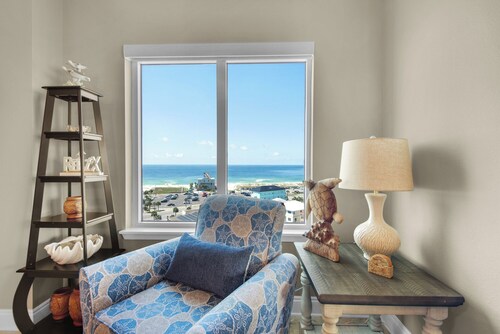 Stunning corner unit in the heart of Pensacola beach with panoramic views.
