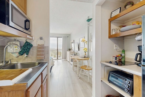 Coastal condo with shared pool, beaches, shopping