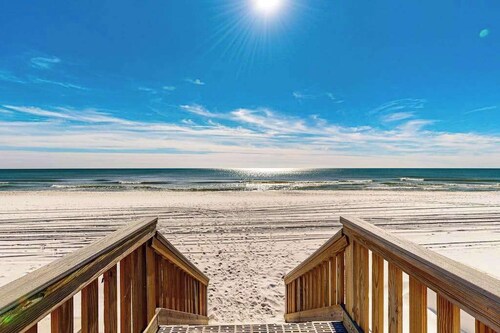 Spacious gulf front condo with beach access and seasonal beach service