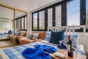 Desk, iron/ironing board, WiFi, bed sheets - Luxe Beachside Oasis: Pool, Parking & Generator (San Juan)