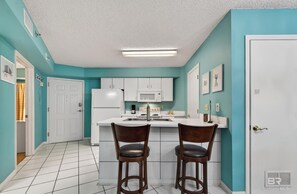 Private kitchen - BEACHFRONT! Convenient, Cozy 2-bedroom condo with HYBRID POOL in Orange Beach (Orange Beach)