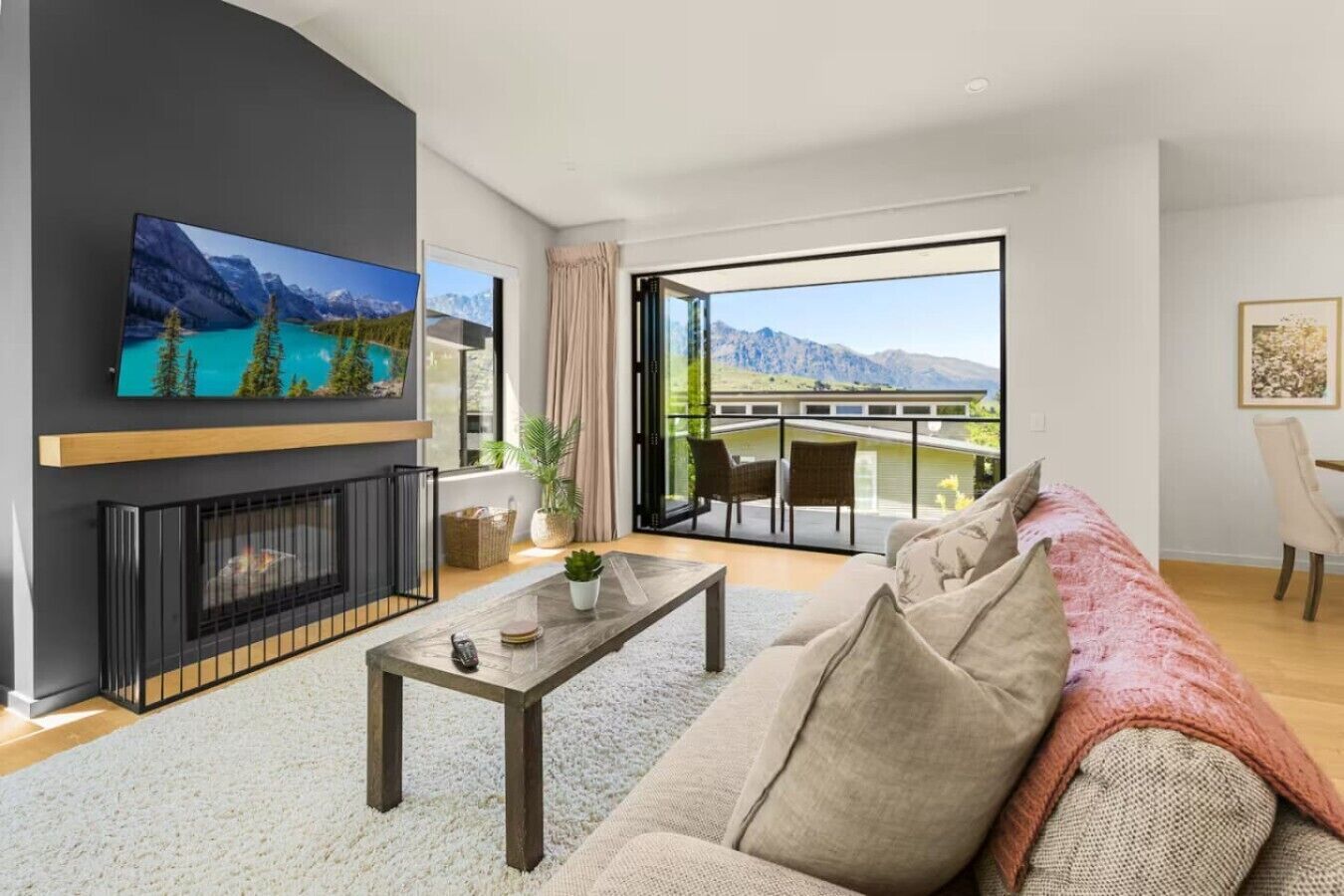 TV, fireplace, books