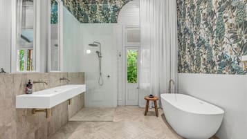 Shower, towels, soap, toilet paper