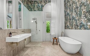 Shower, towels, soap, toilet paper