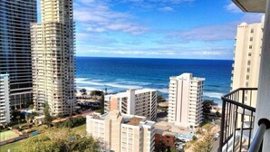 A high-rise building with a view of the ocean. - View - 1627 (1BR/1BA) (Gold Coast)
