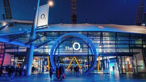 A modern building with a prominent circular logo reading 'The O2' and a large glass entrance. - ✨ River View Apartment Near O2 | Sleeps 6 | Prime Location London ✨ (london)