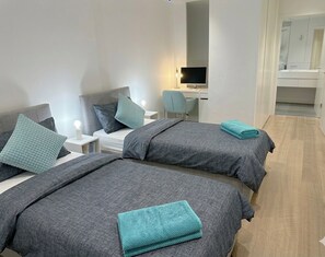 2 habitaciones, tabla de planchar con plancha y wifi gratis 