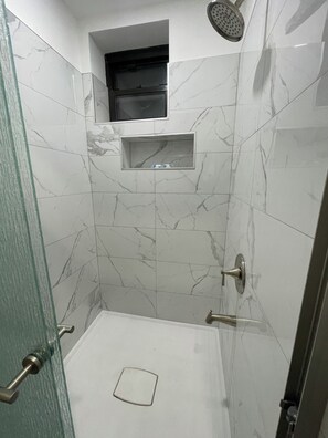 Shower, jetted tub, hair dryer, bidet