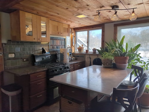 Comfortable lakeside home with a deck in a quiet neighborhood.