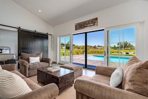 Smart TV, fireplace, books, offices