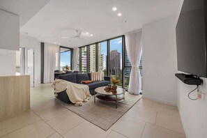 TV, offices - Modern 2BR Apartment with Ocean Views Broadbeach (Broadbeach)