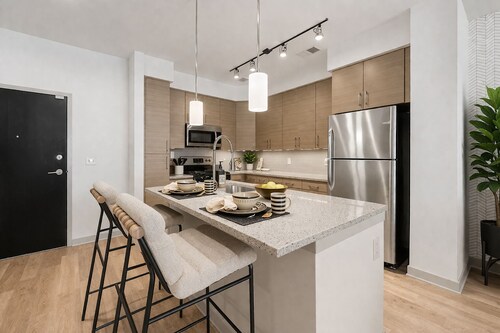 Modern Luxe Apt in Downtown Crown. 
Pool • Gym • Walkable