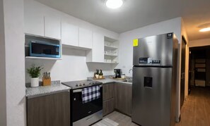 Private kitchen - Modern and spacious 3-bedroom apartment -Luma Stays GT (Santa Catarina Pinula)