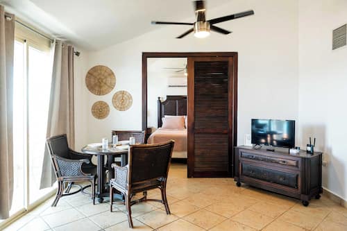 Apartment, 1 Queen Bed, Patio (Costa Bonita 904) | 1 bedroom, individually decorated, individually furnished, bed sheets