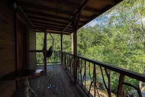 Comfort Cabin, River View | Property grounds - Tohja' Riverside Cabins (San Ignacio)