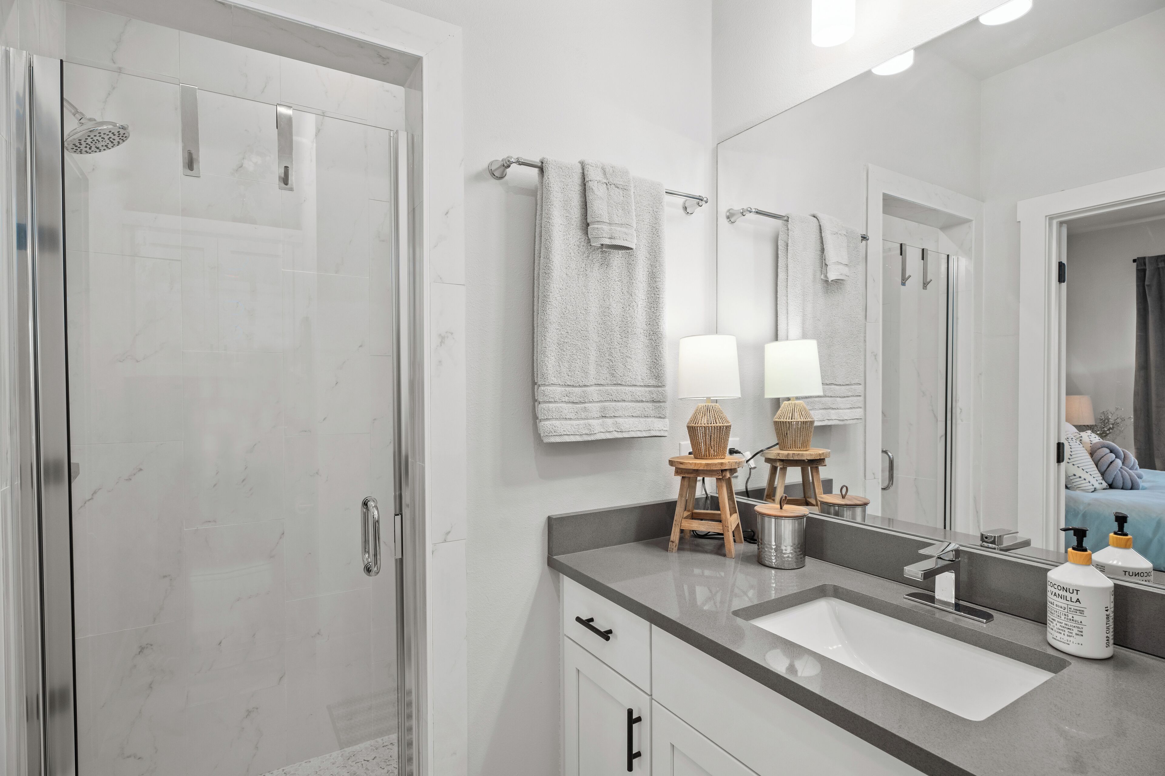 Shower, hair dryer, towels, soap