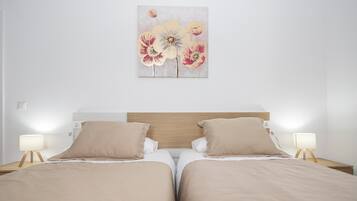2 habitaciones, tabla de planchar con plancha, internet y ropa de cama