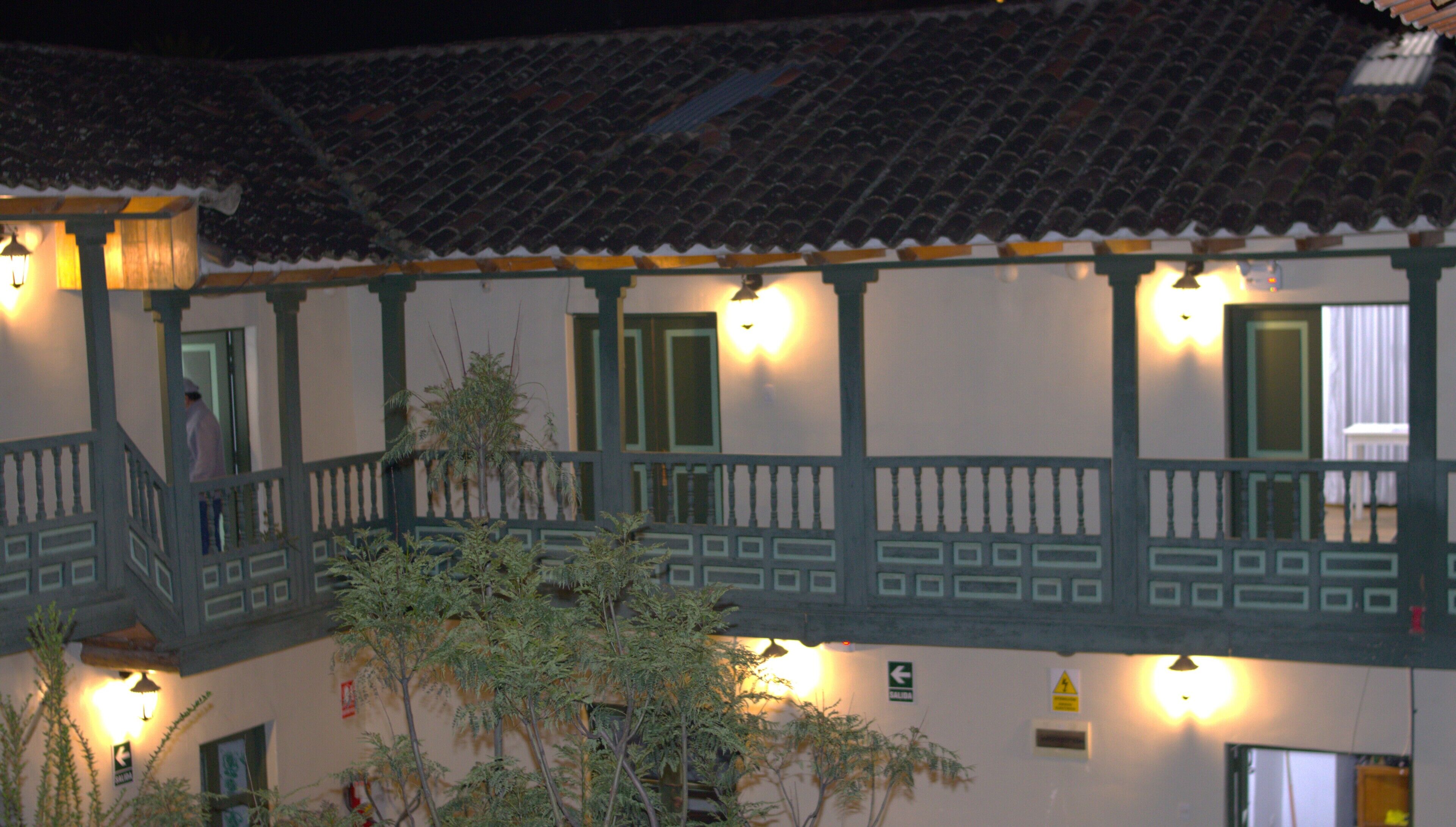 Habitación triple básica, patio, vistas al jardín | Exterior